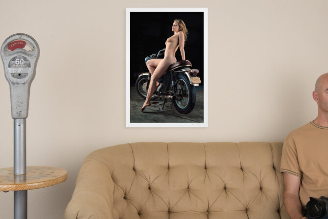 This motorcycle pinup depicts a blonde in profile, perched atop a leather seat. Limited edition art photography for sale.