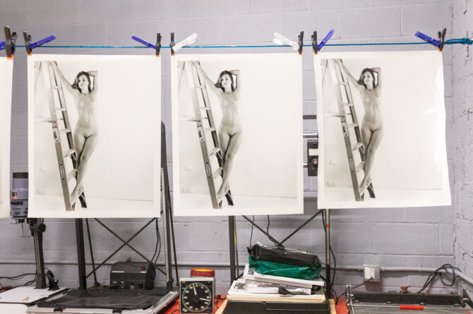 Traditional black and white photography nude woman, hand printed from film darkroom.